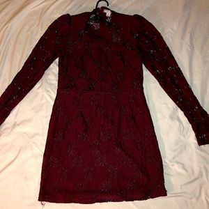 A Favlux Fashion maroon laced long sleeve dress.